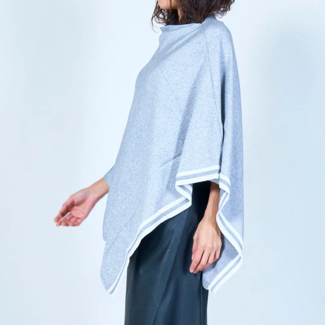 Shimmer knit poncho with asymmetric hem wholesale